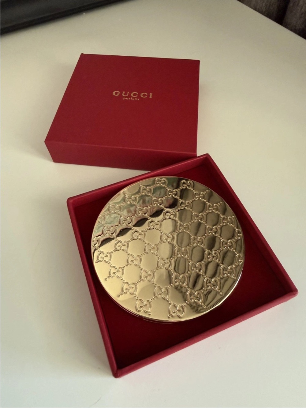 Gucci Gold Round Embossed Compact Mirror with Red Presentation Box